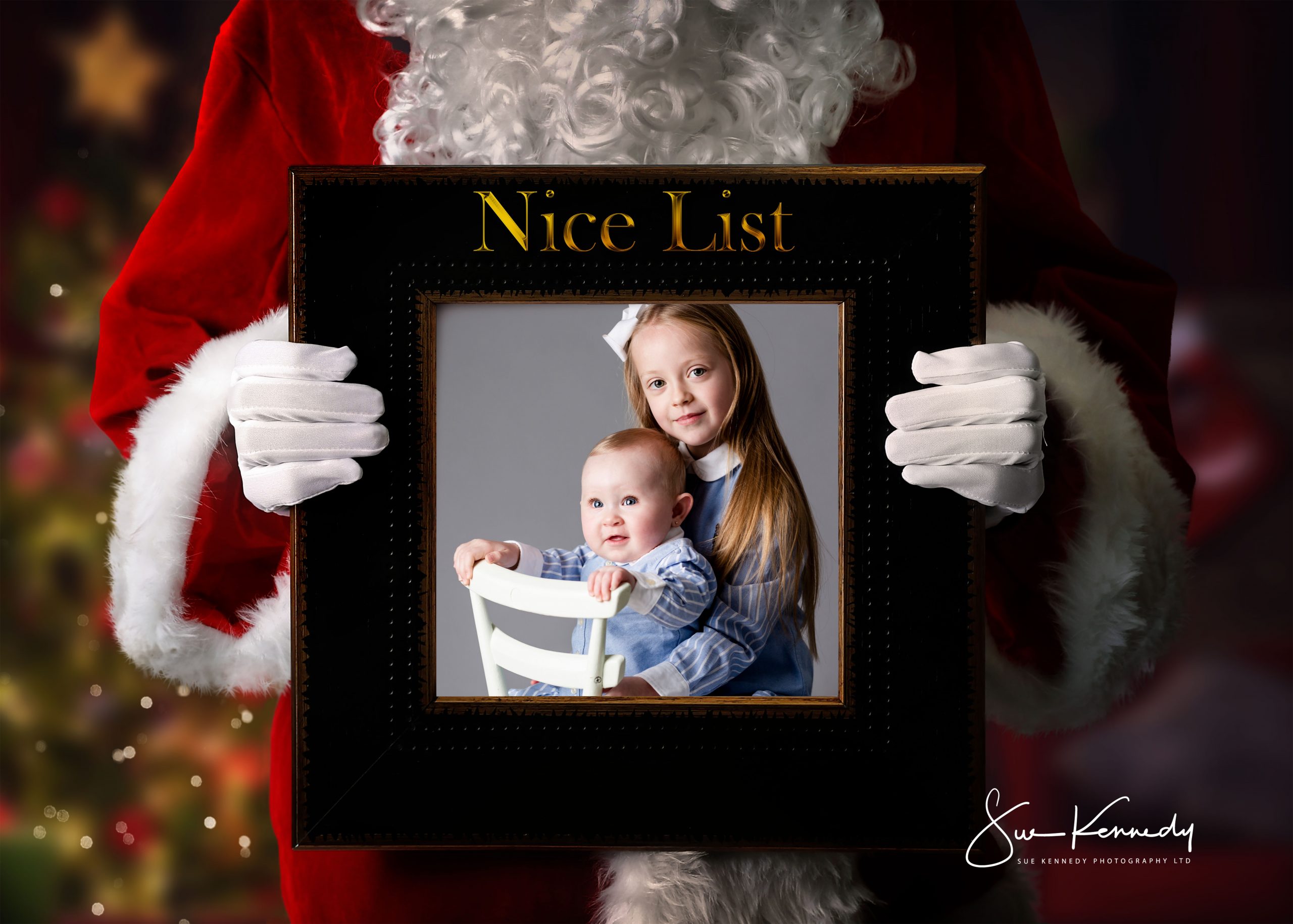 Santa holding a frame for the nice list