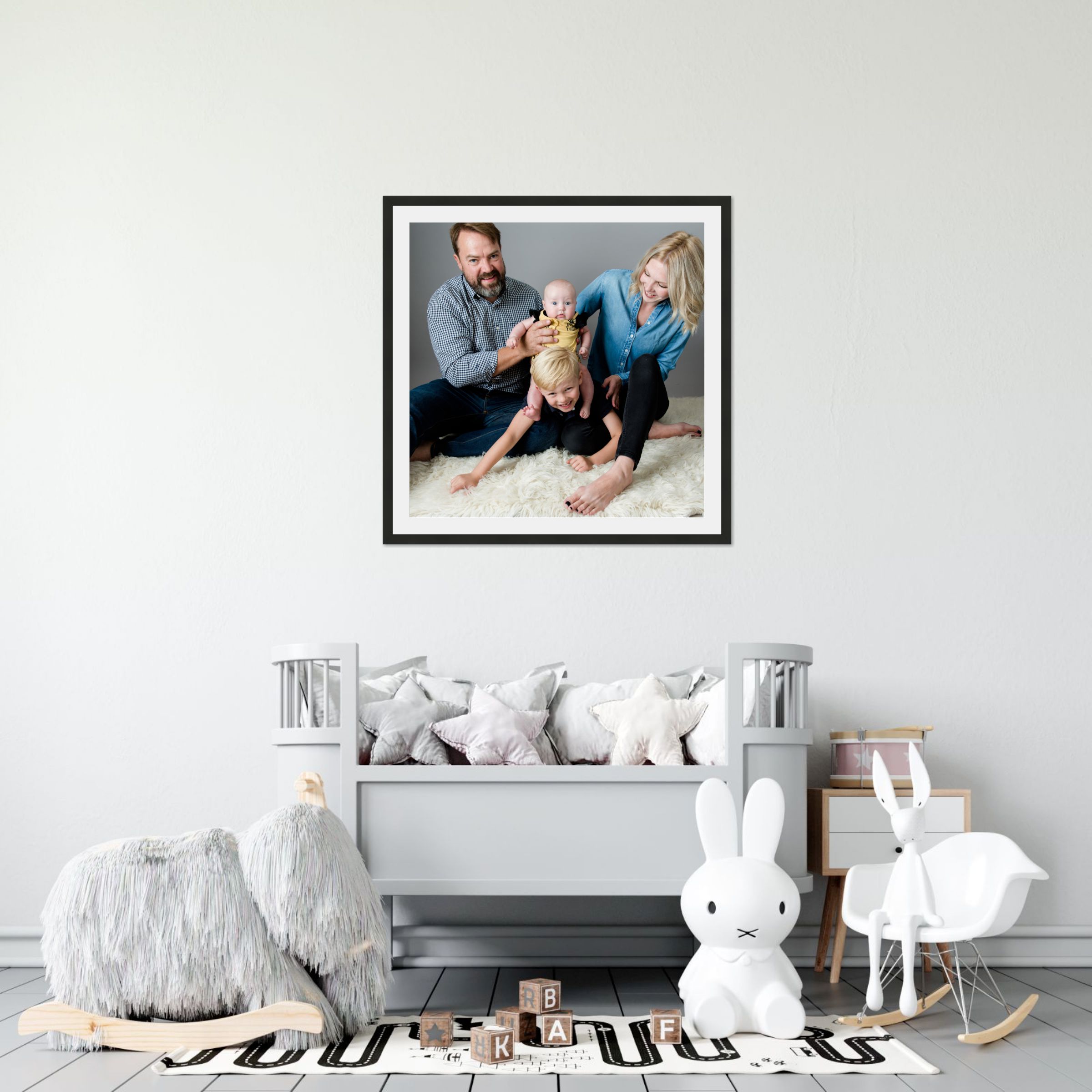 playroom room scene showing a framed family photo on the wall
