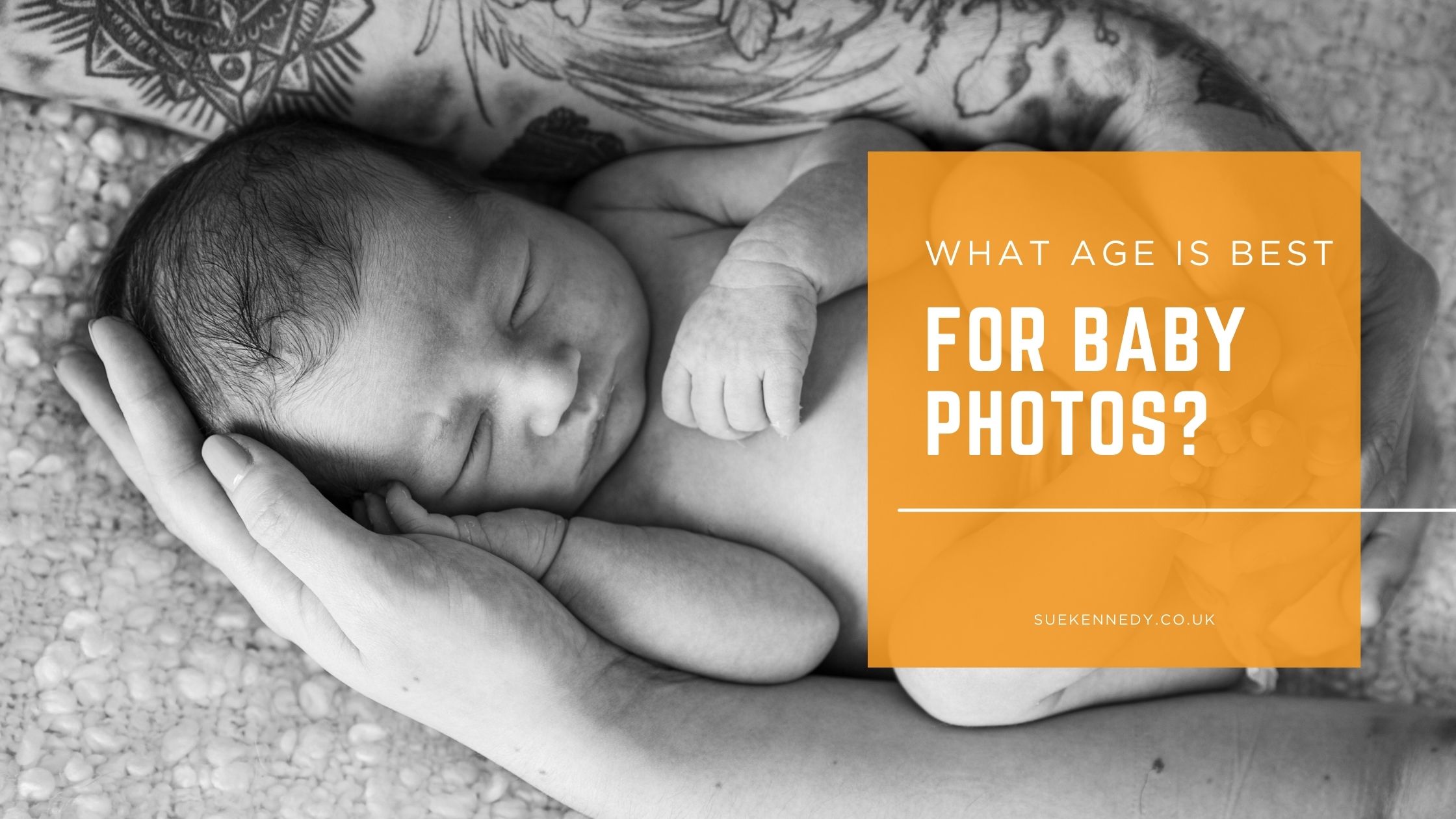 what age is best for baby photos Black and white photograph of a newborn baby sleeping framed by both parents' arms highlighting how small they are in the early days.